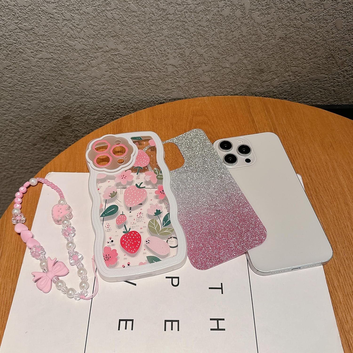 Compatible with iPhone 15plus case, cute wavy edge shell, kawaii strawberry, floral pattern with cute bracelet, made of soft, eco-friendly and durable TPU material, suitable for women and girls